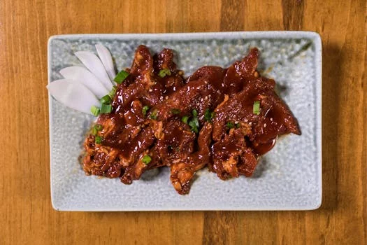 spicy korean bbq wings with sesame seeds