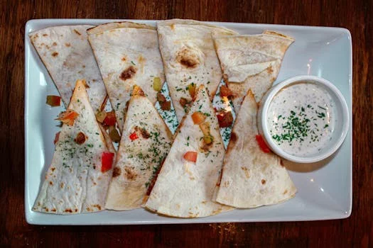 chicken quesadilla with peppers and cheese