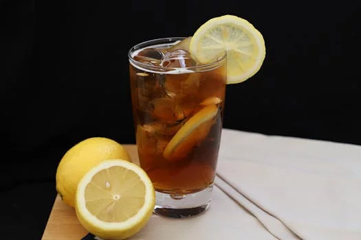 fresh lemonade with ice and lemon slice